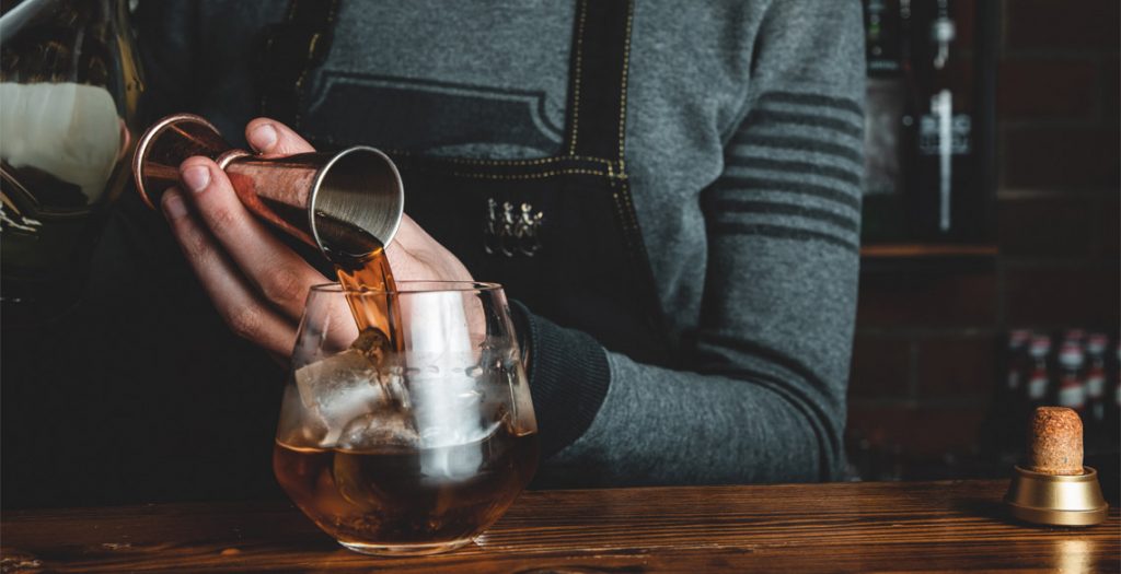 Barman with a cocktail